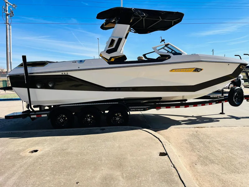 Slide: The Image of 2025 Nautique Super Air Nautique G25 Paragon boat on trailer, side view. - 6