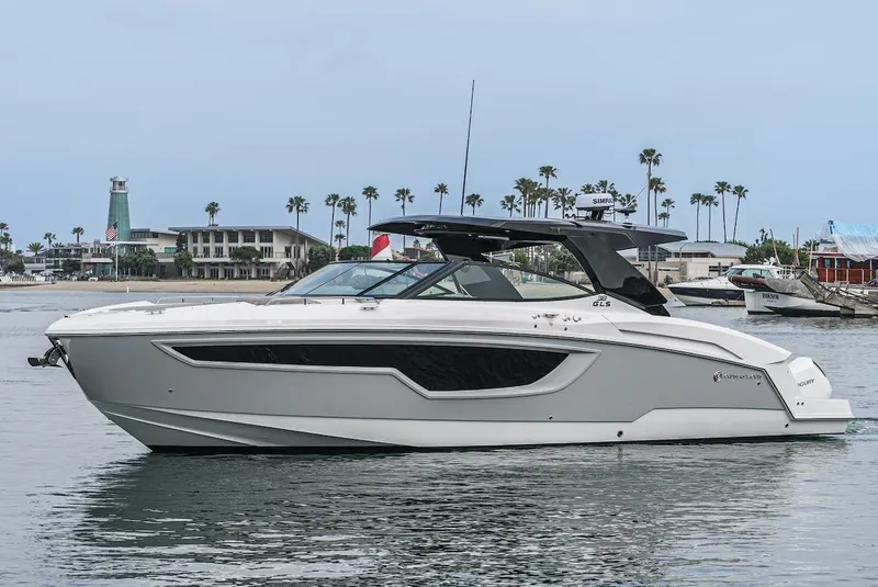 Slide: The Image of 2024 Cruisers Yachts 38 GLS OB on water, sleek design, modern features. - 1