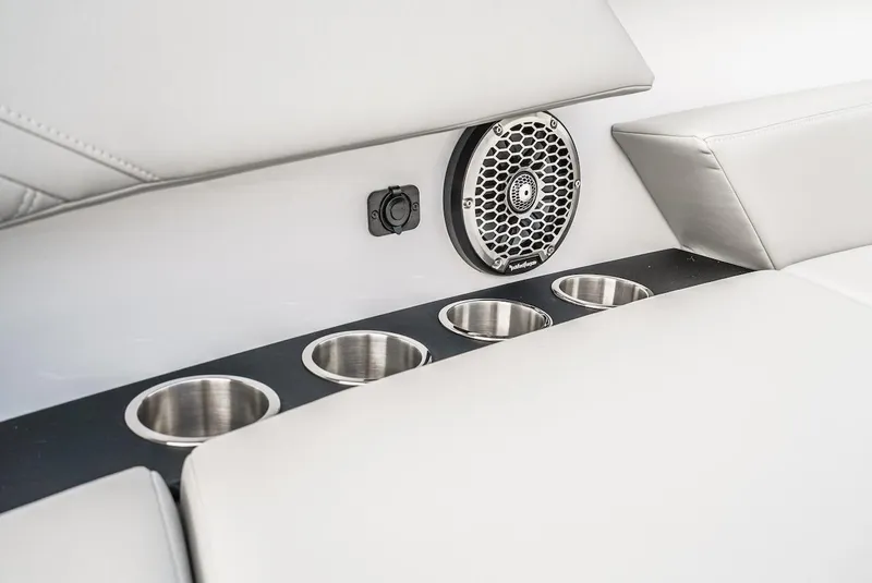 Slide: The Image of 2024 Cruisers Yachts 38 GLS OB interior with cup holders and speaker. - 14