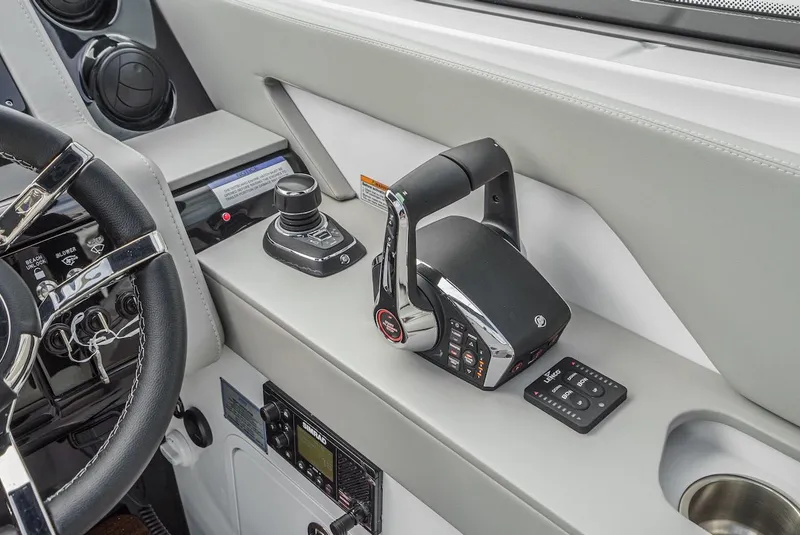 Slide: The Image of 2024 Cruisers Yachts 38 GLS OB helm controls and dashboard detail. - 42