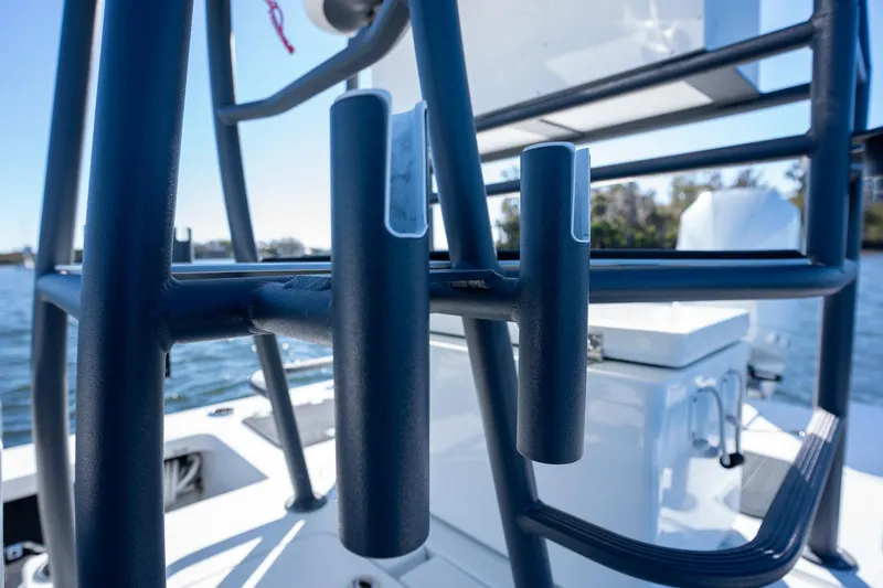 Slide: The Image of Close-up of 2022 Young Boats 24 rod holders on a sleek fishing boat. - 13
