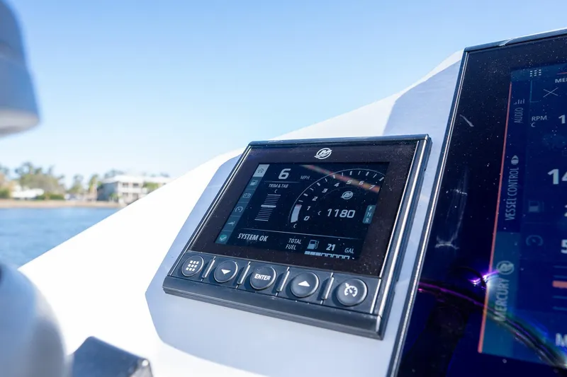 Slide: The Image of Digital dashboard of 2022 Young Boats 24, displaying speed and system information. - 16