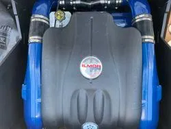Slide: The Image of 2024 MasterCraft X22 engine featuring Ilmor 6.2L GDI, blue and black components. - 18