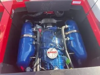 Slide: The Image of 2023 MasterCraft NXT 22 engine compartment with Ilmor engine, blue components. - 4
