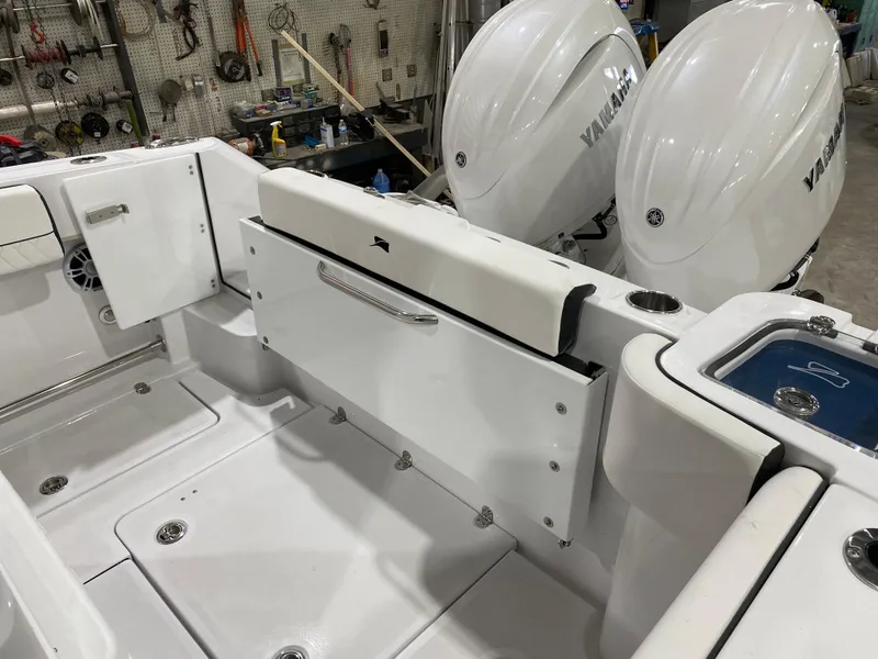 Slide: The Image of 2025 Stingray 253CC boat interior with Yamaha engines, featuring spacious seating and storage. - 7