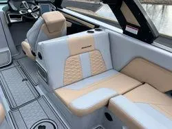 Slide: The Image of 2024 MasterCraft X26 boat interior with luxurious seating and modern design. - 10