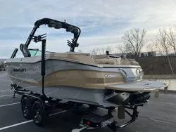 Slide: The Image of 2024 MasterCraft X26 boat on trailer, showcasing sleek design and modern features. - 3