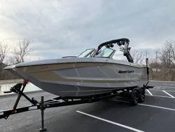 Slide: The Image of 2024 MasterCraft X26 boat interior with modern steering wheel and control panel. - 6