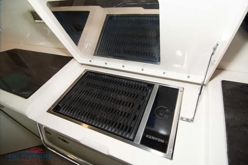 Slide: The Image of Kenyon grill on 2013 Sea Ray 540 Sundancer yacht kitchen counter. - 26