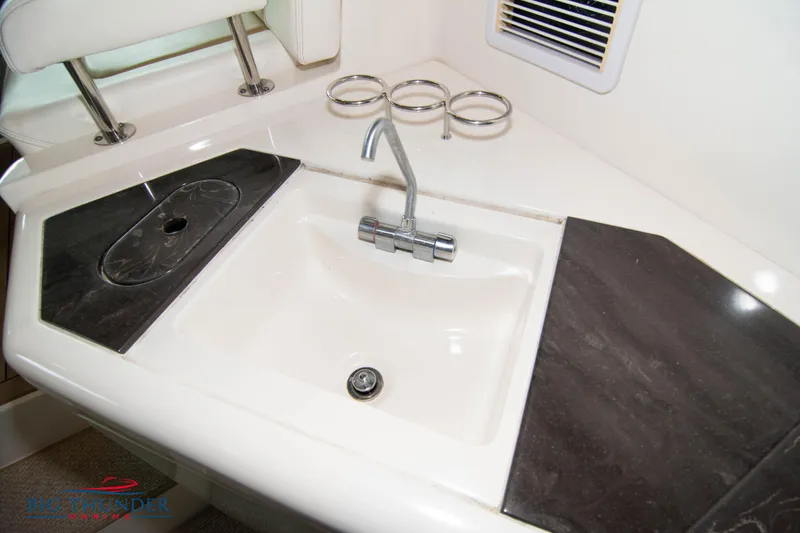 Slide: The Image of Luxury yacht Sea Ray 540 Sundancer 2013 interior sink with modern faucet and countertop. - 27