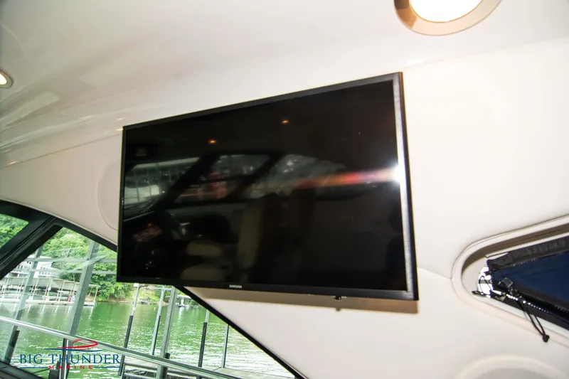 Slide: The Image of Flat-screen TV inside 2013 Sea Ray 540 Sundancer yacht, with scenic water view. - 32