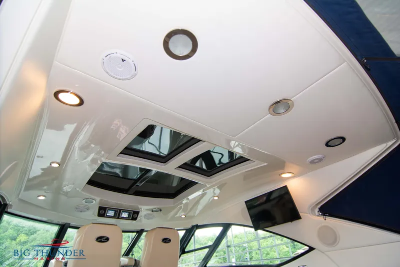 Slide: The Image of Interior view of 2013 Sea Ray 540 Sundancer yacht ceiling with skylights and lighting. - 36