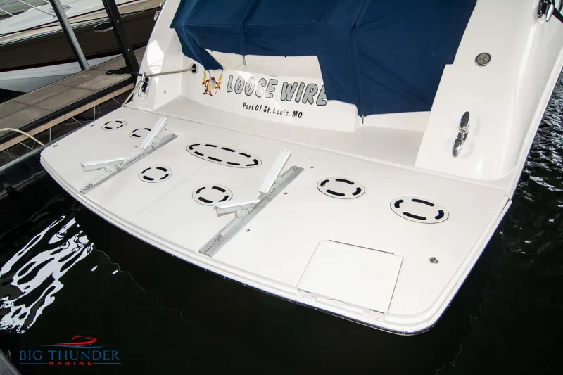 Slide: The Image of 2013 Sea Ray 540 Sundancer yacht stern view at dock. - 8