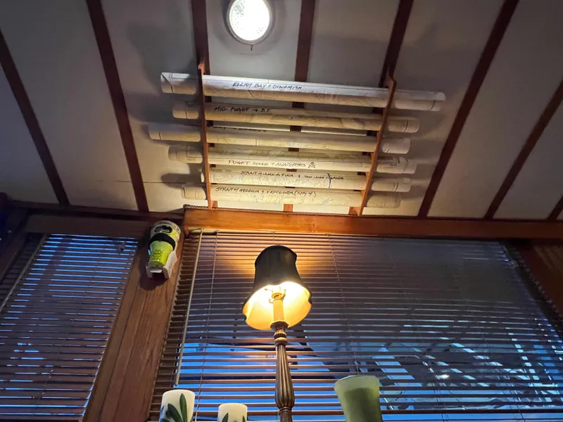 Slide: The Image of Interior of a 1972 Grand Banks 42 Classic with lamp and ceiling storage. - 17