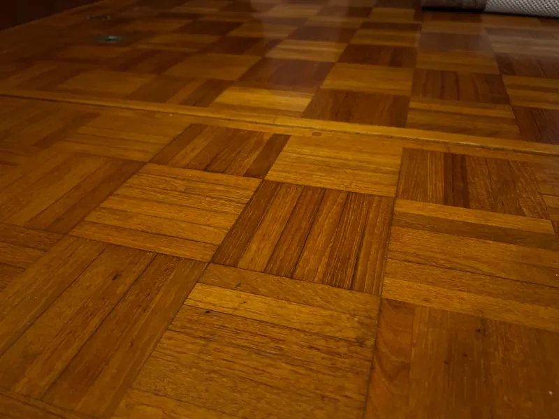 Slide: The Image of Wooden parquet flooring on a 1972 Grand Banks 42 Classic boat. - 19