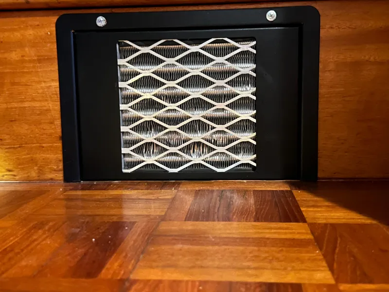 Slide: The Image of Vent with filter on 1972 Grand Banks 42 Classic wooden interior. - 20