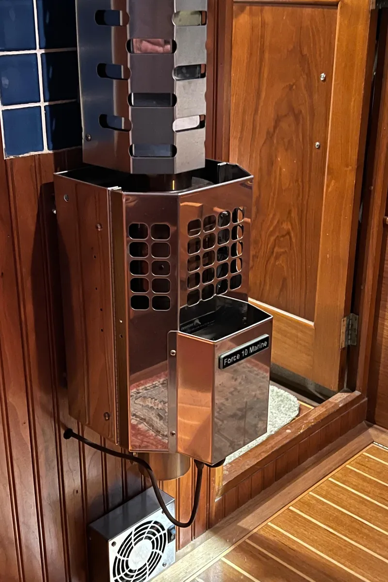 Slide: The Image of Wall-mounted heater in a 1972 Grand Banks 42 Classic boat interior. - 29