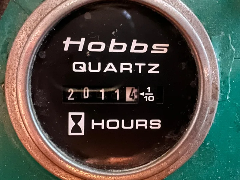 Slide: The Image of Hobbs quartz hour meter showing 20114.4 hours on Grand Banks 42 Classic, 1972 model. - 39