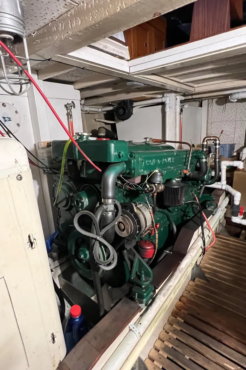 Slide: The Image of Engine room of a 1972 Grand Banks 42 Classic boat, showcasing a vintage marine engine. - 41