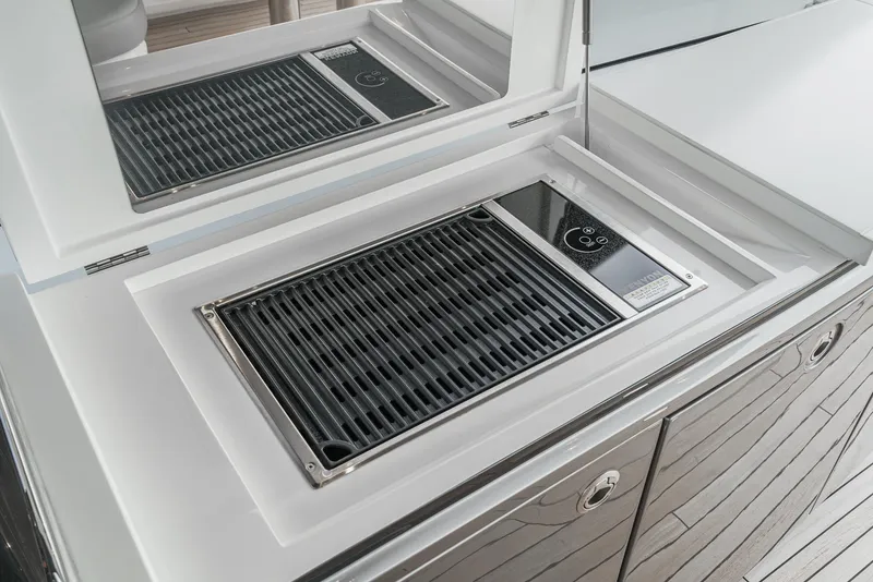 Slide: The Image of Modern grill on 2025 Princess V55 yacht, sleek design and functionality. - 15