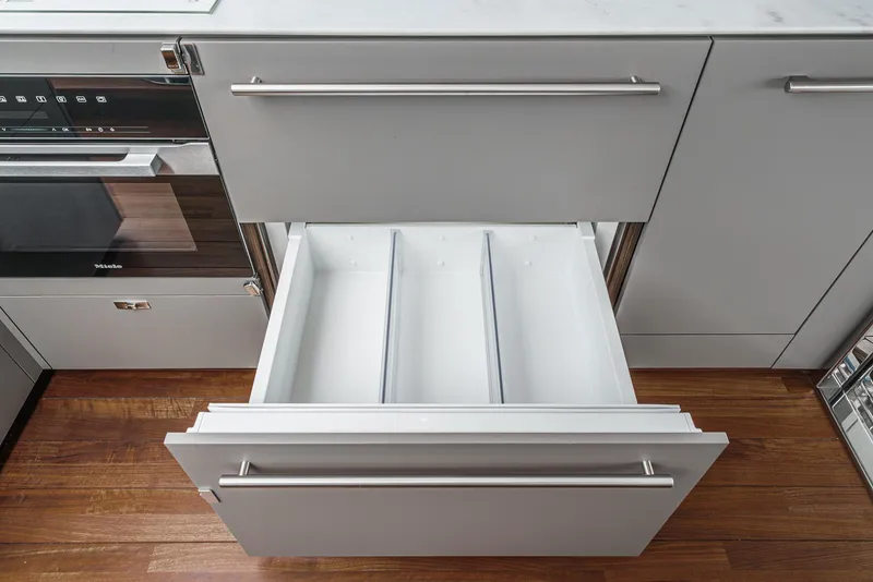Slide: The Image of Open kitchen drawer with dividers, Princess V55 model, 2025, modern design. - 20