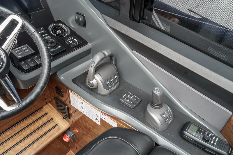 Slide: The Image of Control panel of 2025 Princess V55 yacht with advanced navigation and communication systems. - 33