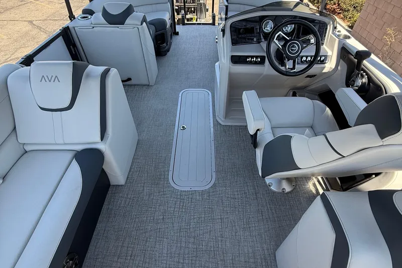 Slide: The Image of Interior of 2025 Avalon 2185 LSZ QL pontoon boat with modern seating and steering console. - 4