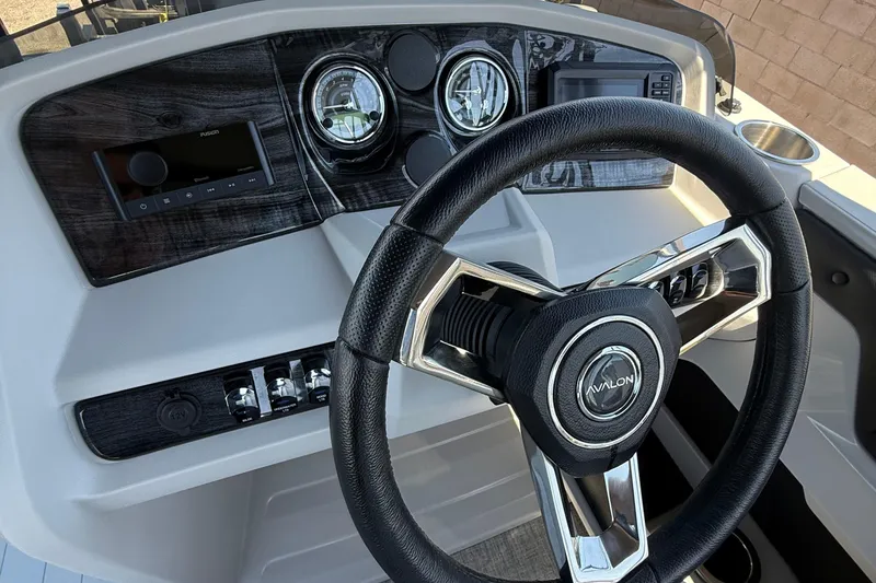 Slide: The Image of 2025 Avalon 2185 LSZ QL dashboard with steering wheel and control panel. - 5