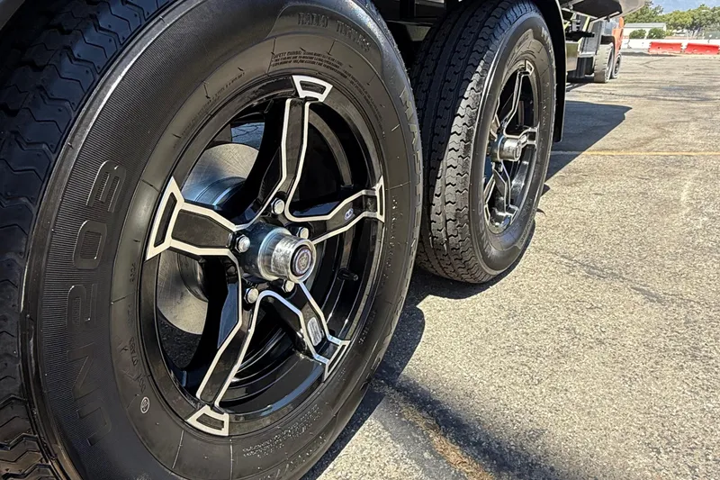 Slide: The Image of Close-up of 2025 Avalon 2185 LSZ QL wheels on asphalt surface. - 6