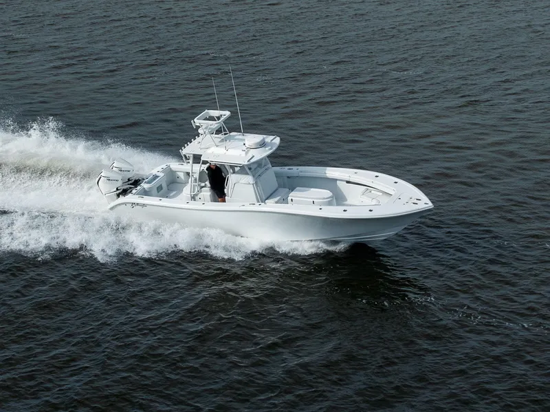 Slide: The Image of 2021 Yellowfin 36 Offshore boat cruising on open water. - 10