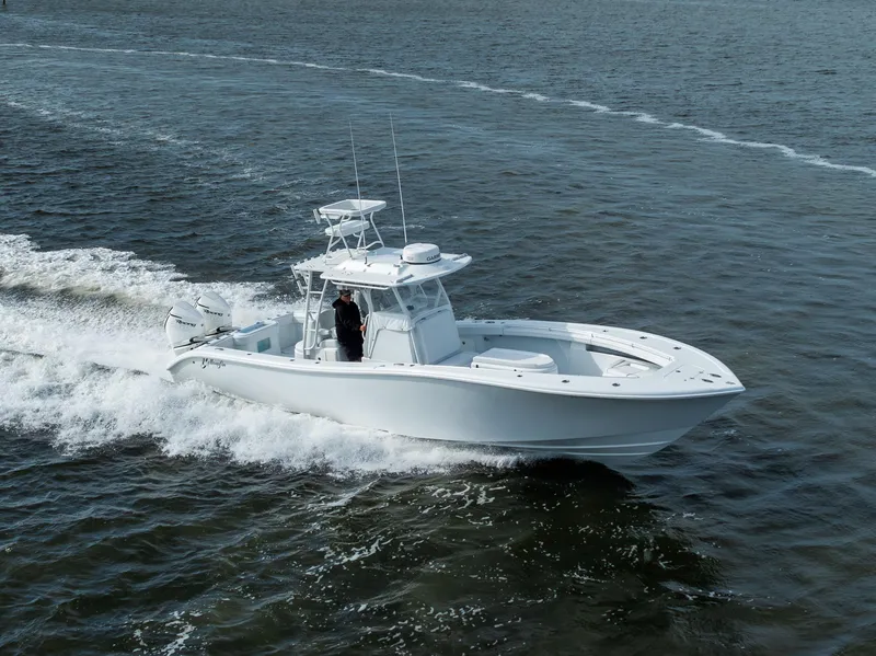 Slide: The Image of 2021 Yellowfin 36 Offshore boat cruising on open water. - 11