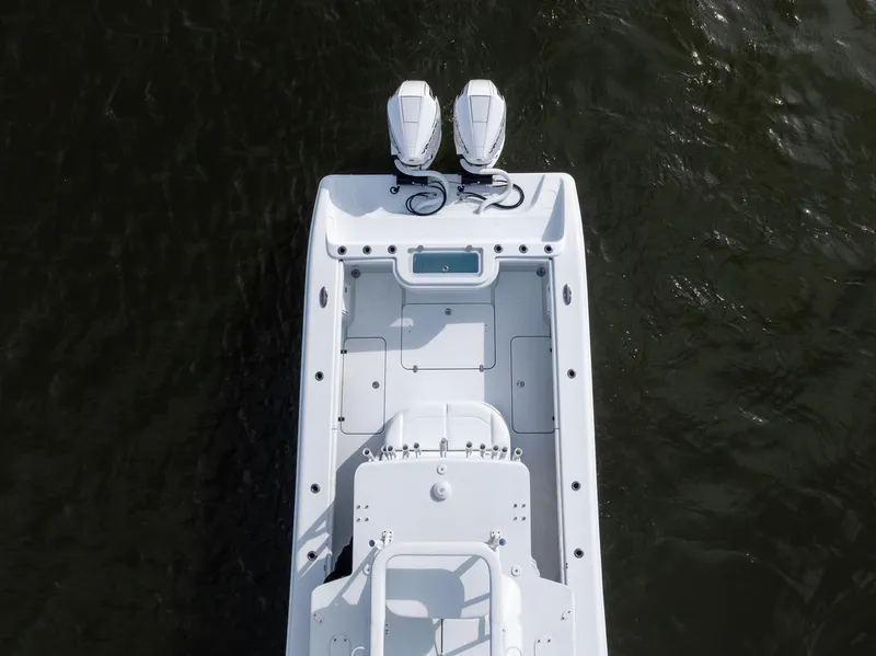 Slide: The Image of Aerial view of 2021 Yellowfin 36 Offshore boat with dual engines on water. - 16