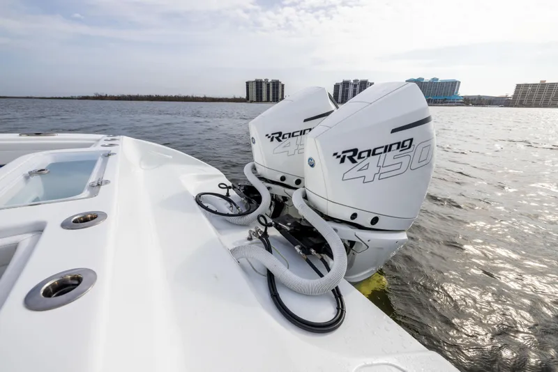 Slide: The Image of 2021 Yellowfin 36 Offshore boat with twin Racing 450 engines on the water. - 23