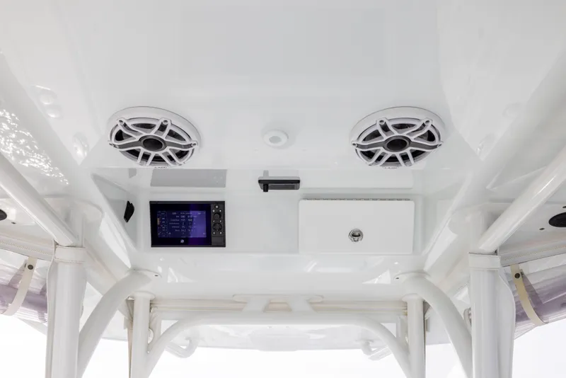 Slide: The Image of 2021 Yellowfin 36 Offshore boat interior with speakers and control panel. - 37