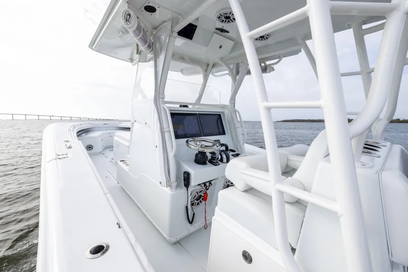 Slide: The Image of 2021 Yellowfin 36 Offshore boat interior with modern console and seating. - 43