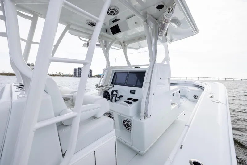 Slide: The Image of 2021 Yellowfin 36 Offshore boat interior with modern helm and seating. - 44
