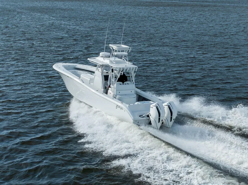 Slide: The Image of 2021 Yellowfin 36 Offshore boat cruising on open water. - 9