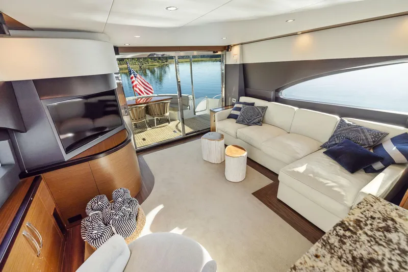 Slide: The Image of Luxurious 2016 Hatteras M60 yacht interior with modern kitchen and dining area. - 19