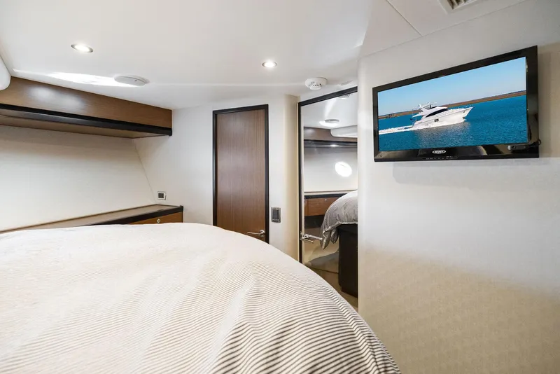 Slide: The Image of Luxurious cabin interior of 2016 Hatteras M60 yacht with modern amenities. - 30