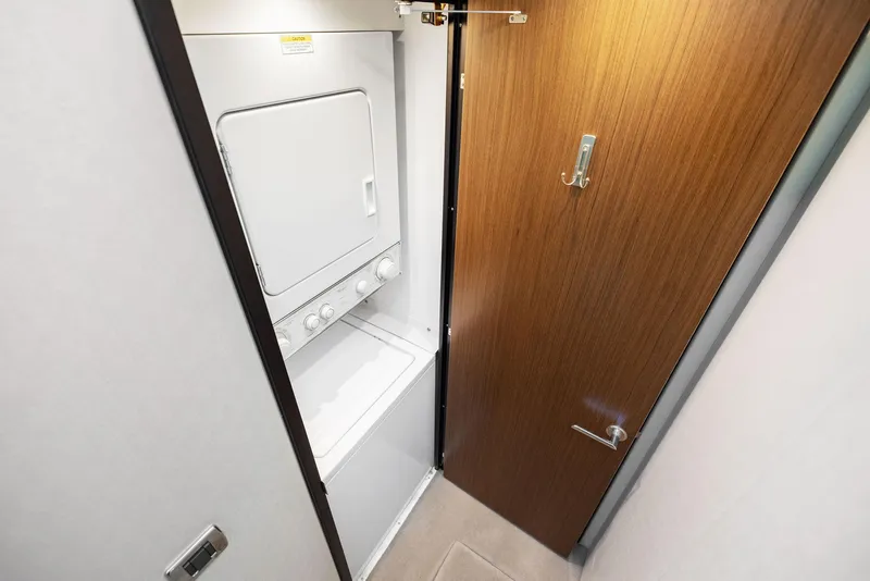 Slide: The Image of Luxurious bedroom interior of 2016 Hatteras M60 yacht with elegant decor. - 36