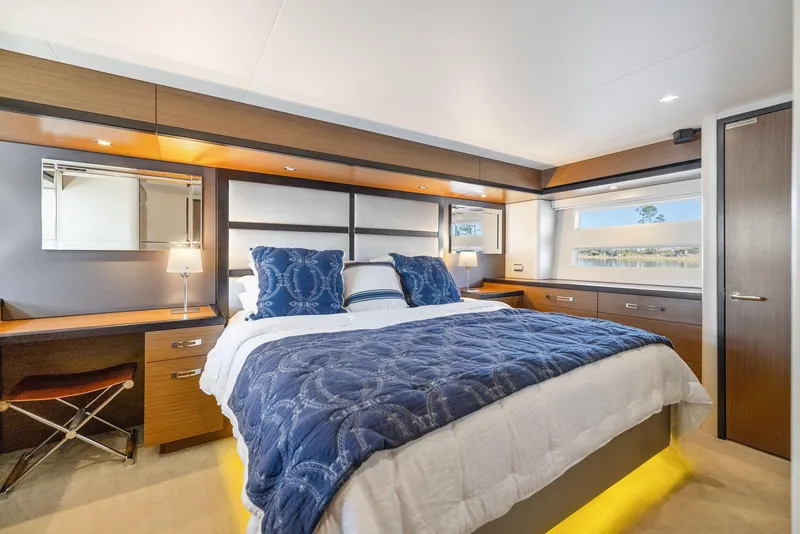 Slide: The Image of Luxurious bedroom interior of 2016 Hatteras M60 yacht with elegant bedding and modern design. - 37