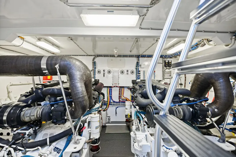 Slide: The Image of Engine room of 2016 Hatteras M60 yacht, showcasing machinery and equipment. - 43