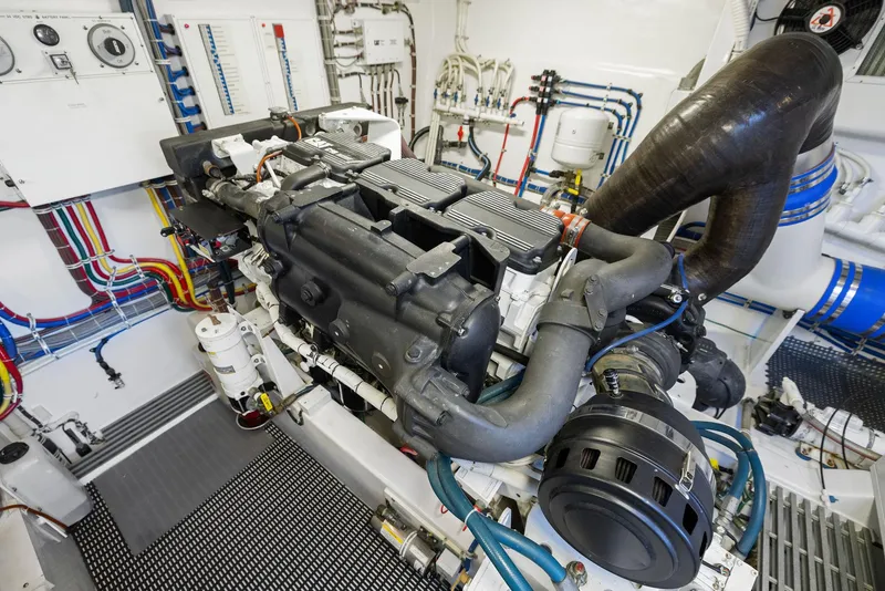 Slide: The Image of Engine room of 2016 Hatteras M60 yacht, featuring advanced machinery and equipment. - 45