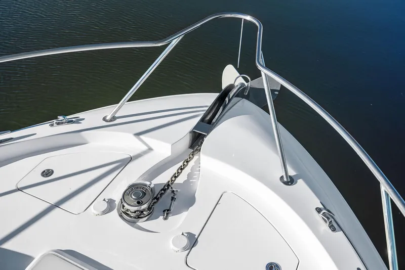 Slide: The Image of 2016 Hatteras M60 yacht on serene blue water. - 5