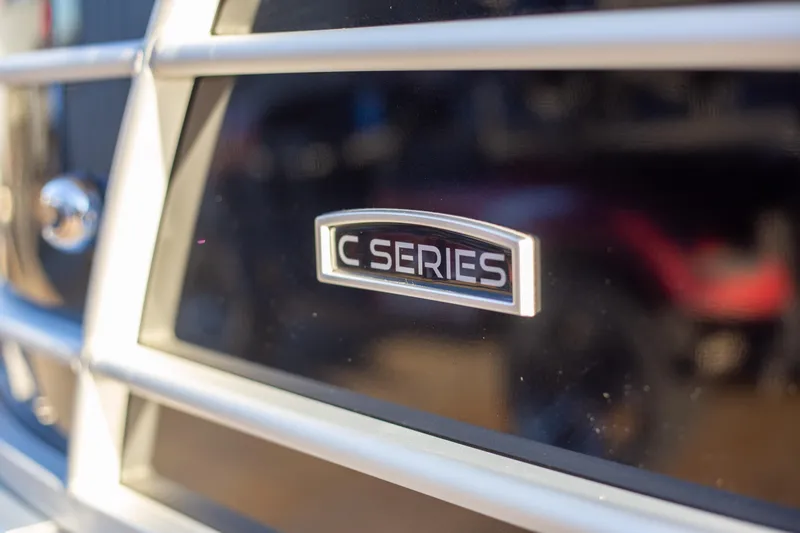 Slide: The Image of Close-up of 2025 Trifecta 24UL CS C Series emblem on a sleek surface. - 4