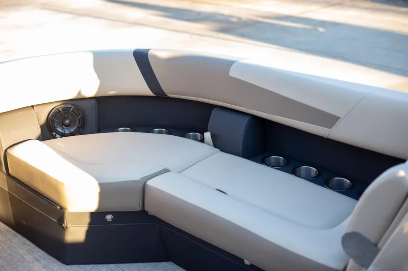 Slide: The Image of Luxurious seating area on 2025 Trifecta 24UL CS boat with cup holders. - 7