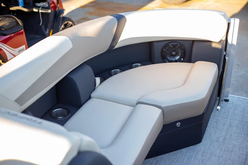 Slide: The Image of Luxurious seating on 2025 Trifecta 24UL CS pontoon boat with cup holders and speaker. - 8
