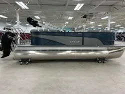 Slide: The Image of 2024 Crest Classic DLX 200 pontoon boat in showroom. - 4