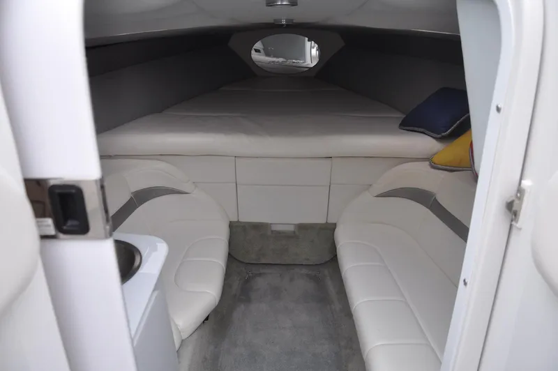 Slide: The Image of 2006 Formula 271 FASTech cabin interior with white seating and bed. - 14