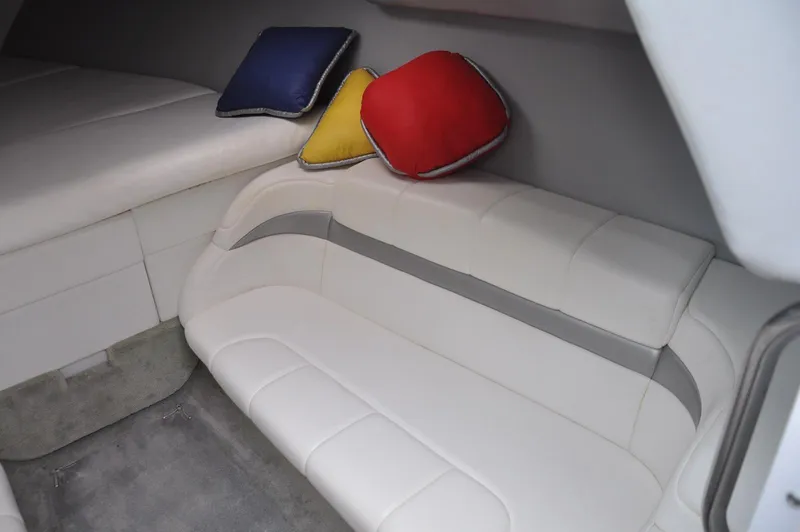 Slide: The Image of 2006 Formula 271 FASTech cabin interior with white seating and colorful cushions. - 15